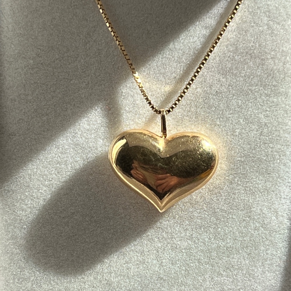 Gold plated heart charm with 10k gold chain.